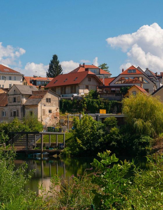 a body of water with buildings around it