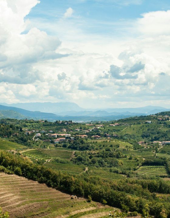 aerial photography of green mountain under cloudy sky during daytime